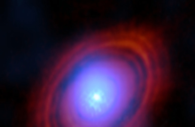 Los astrónomos han detectado una gran cantidad de vapor de agua en el disco protoplanetario que rodea a una estrella joven.